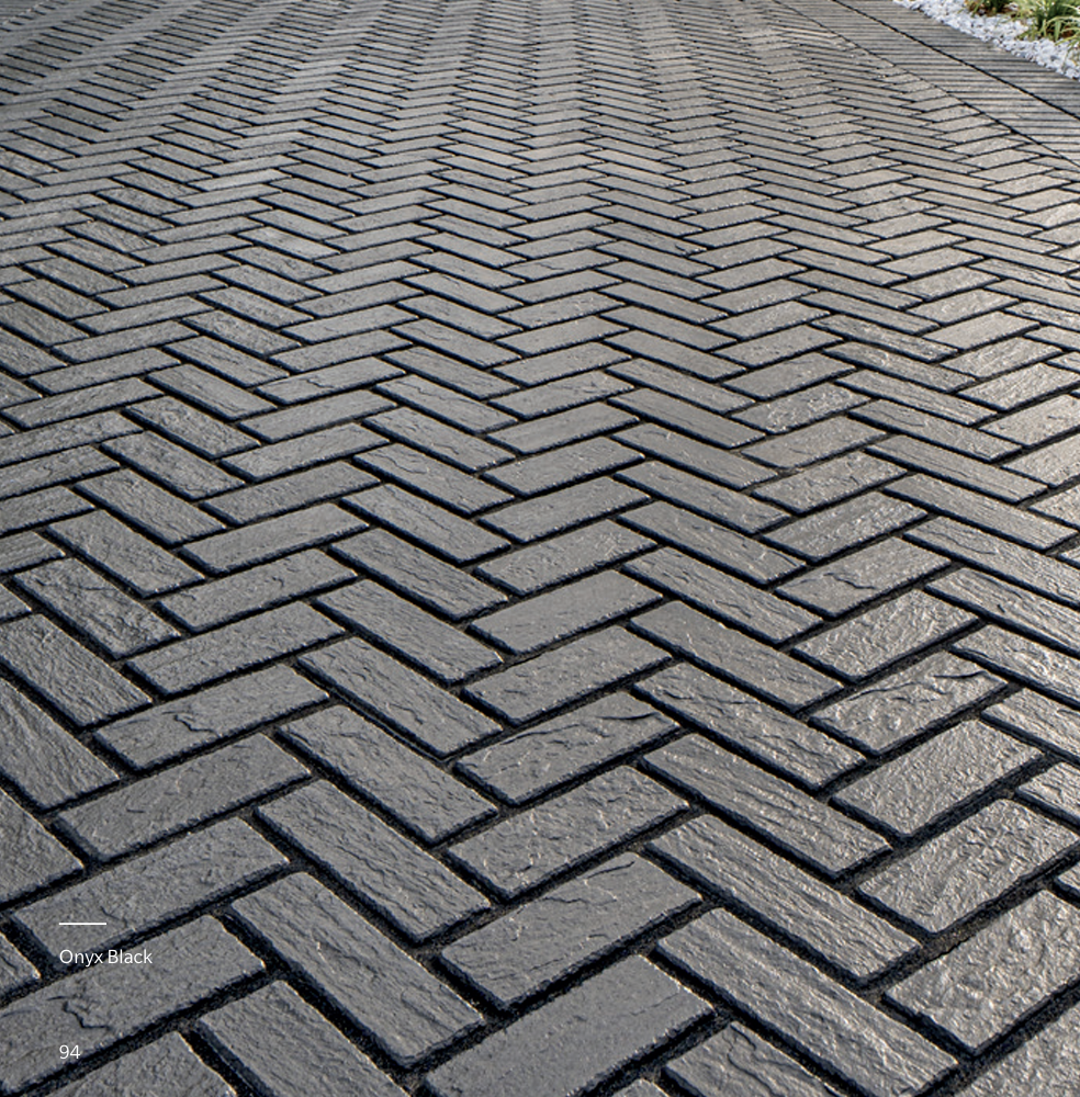 Interlock wall and natural stone repair — retaining wall and paver surface restoration